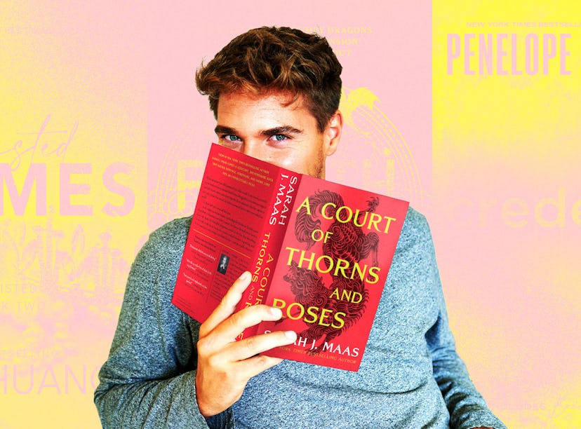 A guy reading ACOTAR, one of several men who have grown followings on SmutTok.