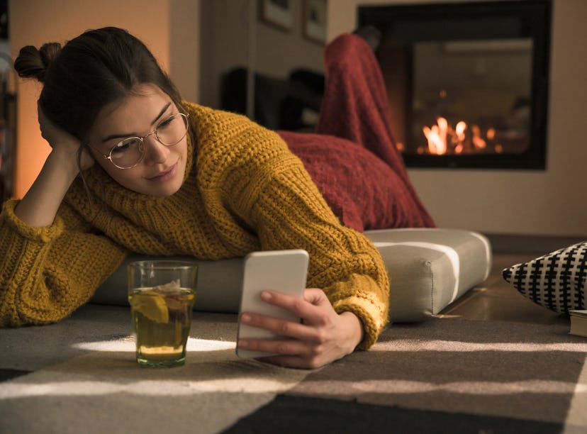 Gen Z woman sending a dirty texts to her boyfriend in the morning