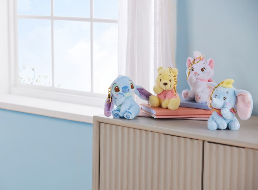 Disney Store is getting pastel plush keychains of characters like Winnie the Pooh and Stitch from Di...