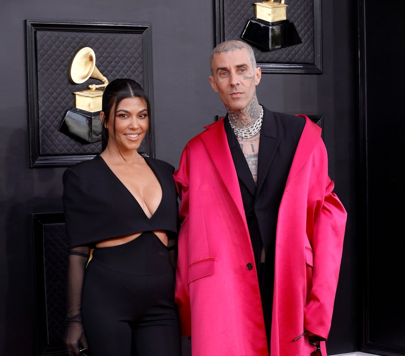LAS VEGAS, NEVADA - APRIL 03: (L-R) Kourtney Kardashian and Travis Barker attend the 64th Annual GRA...